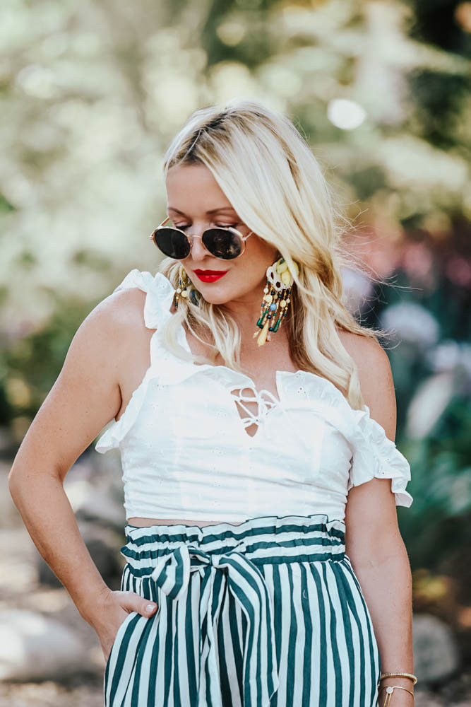 Zara Striped Pants, Eyelet Top, Straw Bag featured by popular Los Angeles fashion blogger The Hunter Collector 