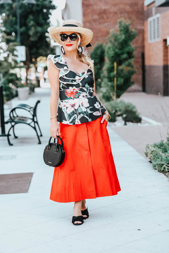 Floral Ruffle Top, Midi Skirt & Straw Hat featured by popular Los Angeles fashion blogger The Hunter Collector